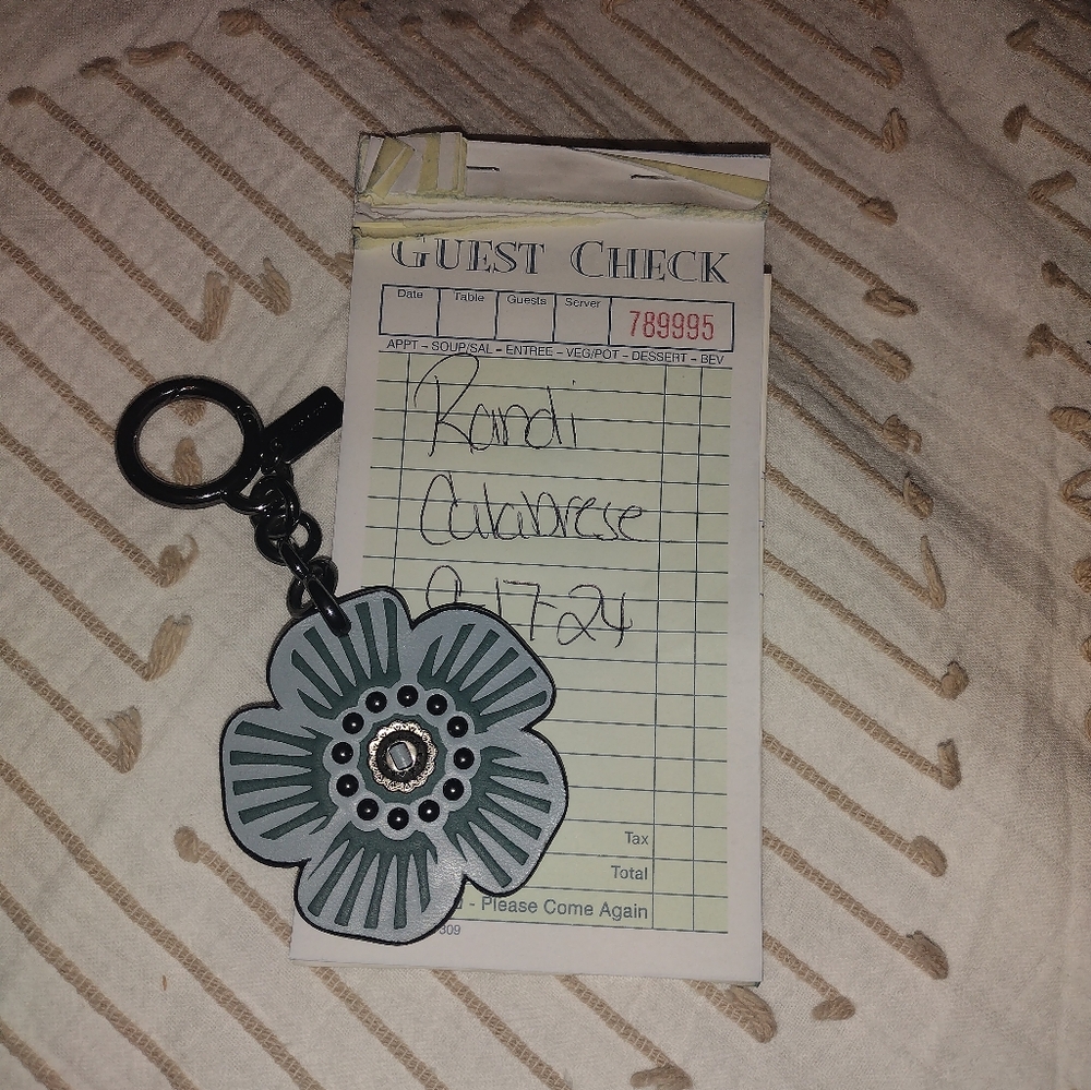 Coach Tea Rose charm keychain